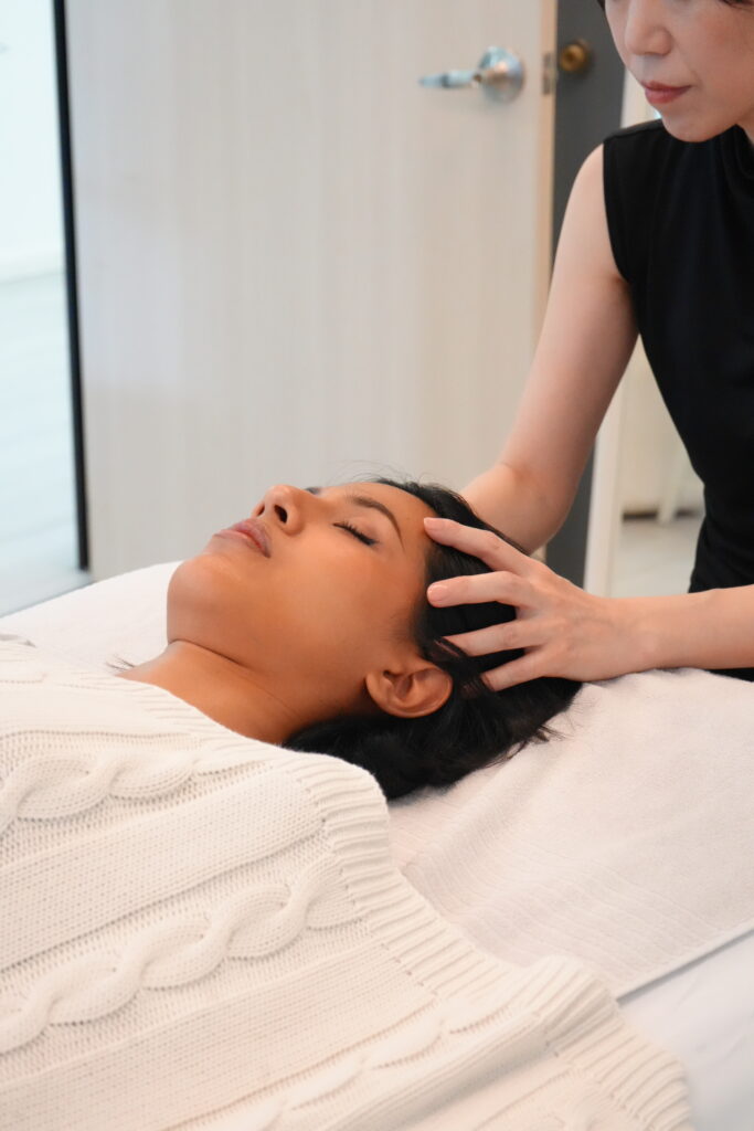 A guest relaxing during a hands-on session
